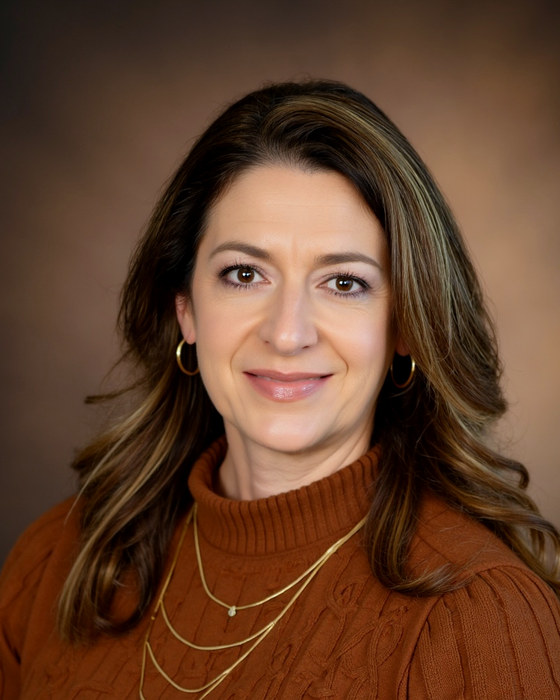 Arcelia Emerson, MA, LPC Associate, in a studio portrait.